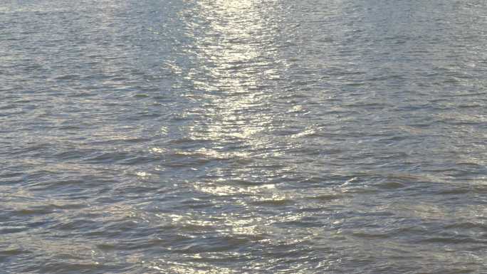阳光水面海面阳光波光粼粼湖面俯拍特写波纹