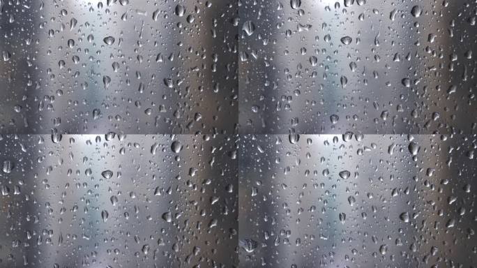 下雨玻璃雨滴窗户雨水珠