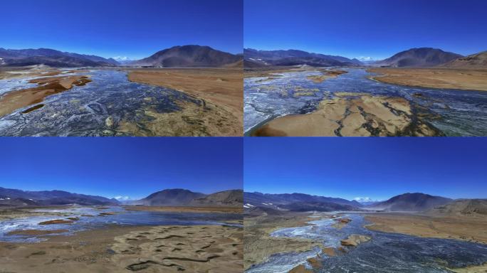 航拍西藏蓝天河谷冰川沙漠