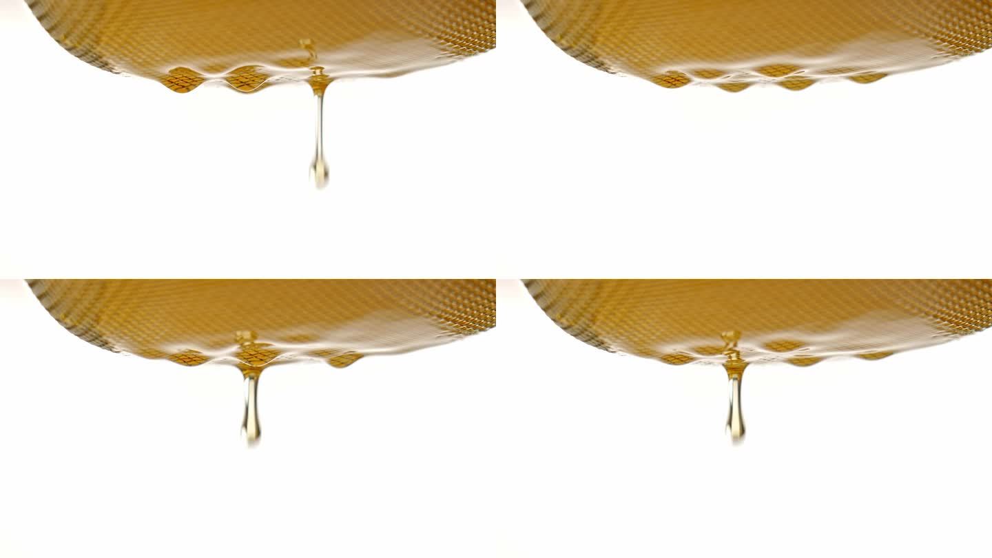 金黄色的食用油液体慢动作掉落