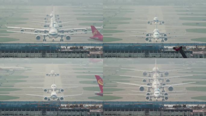 正前方拍摄机场飞机排队滑行等待起飞