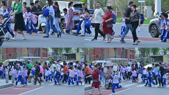 学生放学，家长接送学生过马路