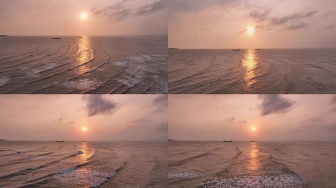 日落倒映在海面 弧形的千层浪泛起金色海浪