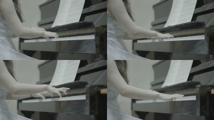 女性弹钢琴手部特写