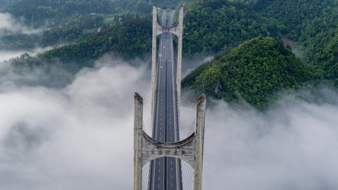 航拍山区云雾中的高速路高架桥