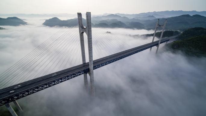 航拍山区云雾中的高速路高架桥