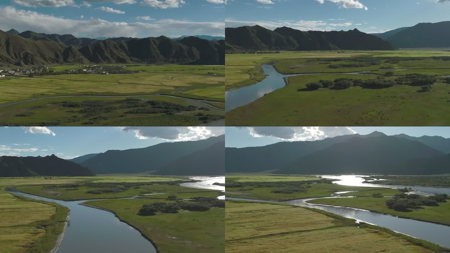 航拍西藏拉孜青稞田湿地村庄