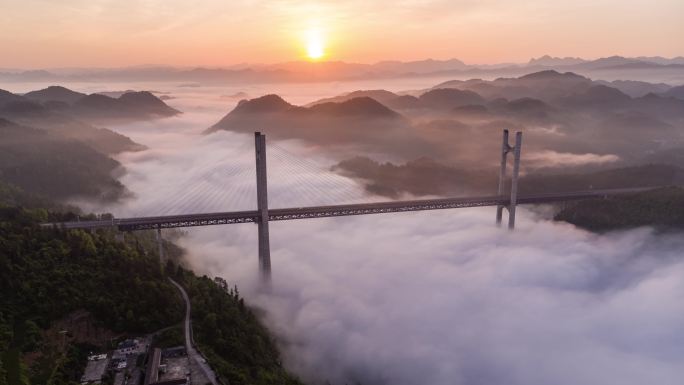 航拍山区云雾中的高速路高架桥