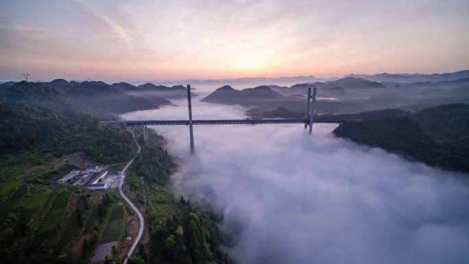 航拍山区云雾中的高速路高架桥