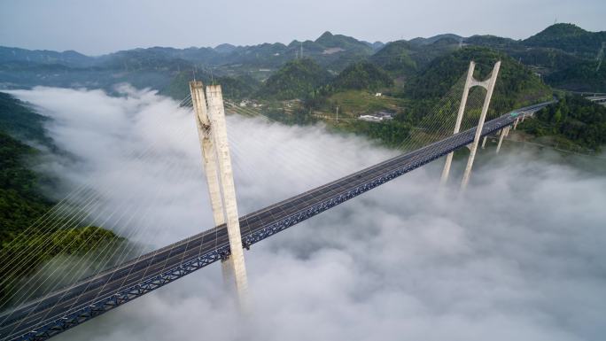 航拍山区云雾中的高速路高架桥