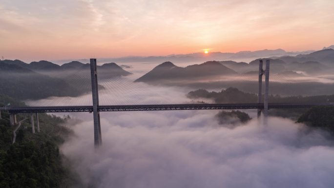 航拍山区云雾中的高速路高架桥