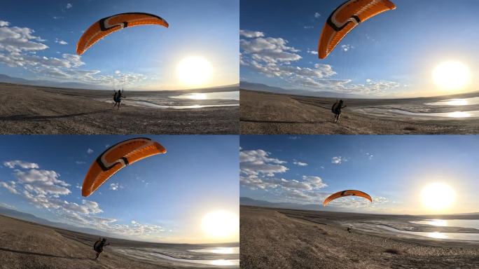 原声素材滑翔伞飞行员在夕阳下从戈壁滩起飞