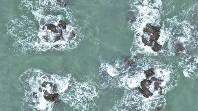 俯拍海岸礁石海浪拍打岩石海水海边浪花潮水