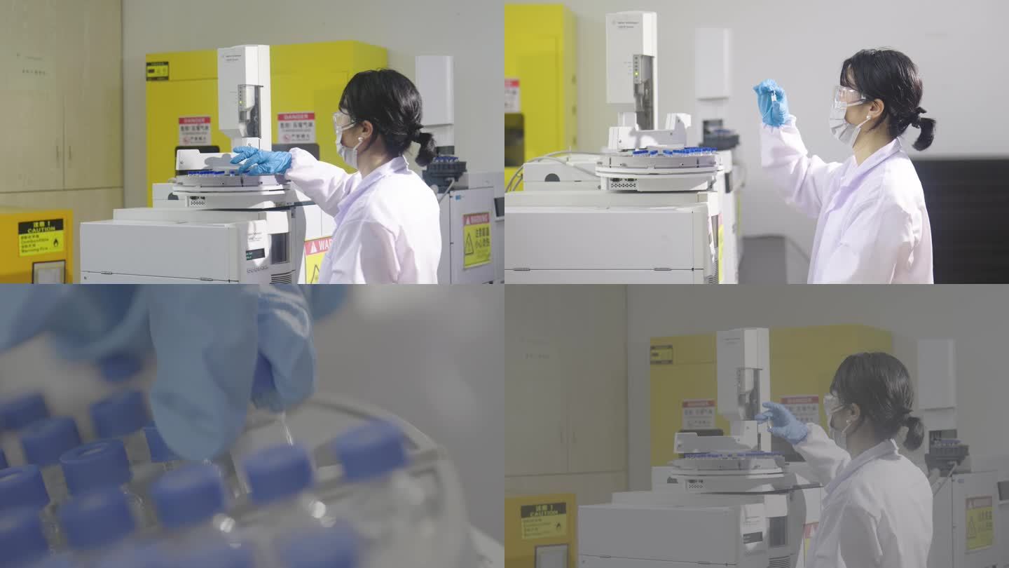 研究人员拿起小瓶子摇晃观察研发实验室检测