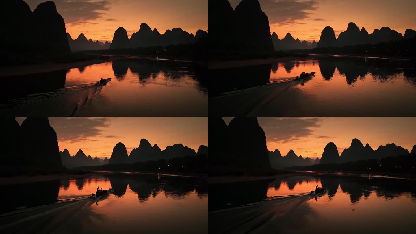 行驶在桂林山水中的渔船
