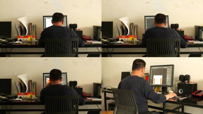 一个中年男人坐在电脑前设计图片