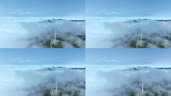 春天阳光下桂林高山上的云雾和风力发电风车