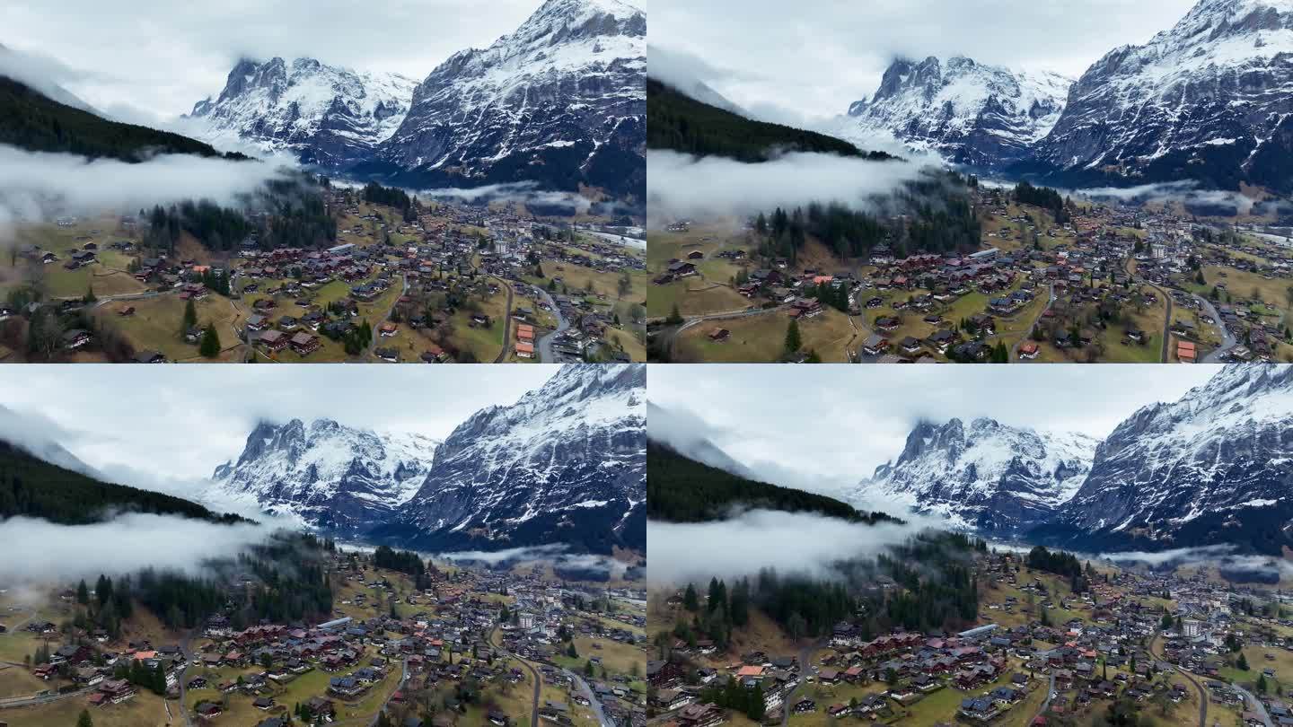 4K正版-航拍瑞士格林德瓦小镇雪山晨雾4