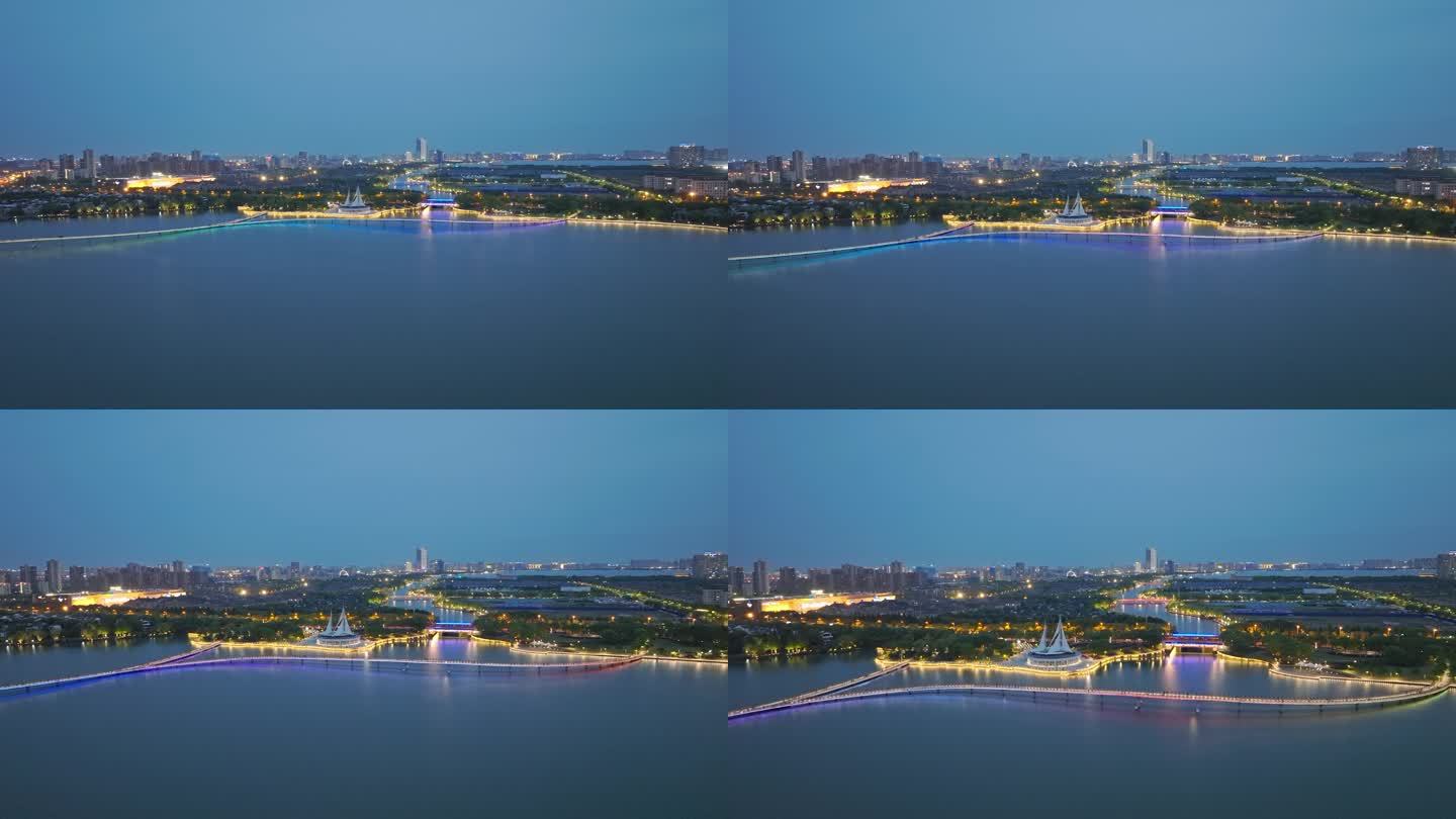苏州金鸡湖船帆雕塑金水湾栈桥夜景航拍