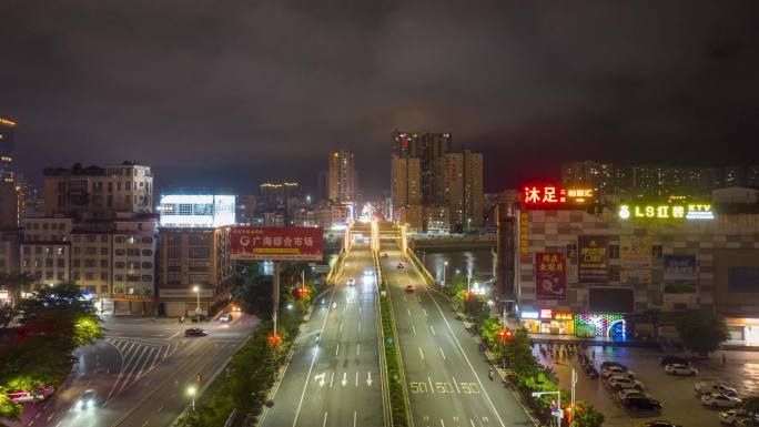 航拍化州市夜晚北京路北京大桥车水马龙