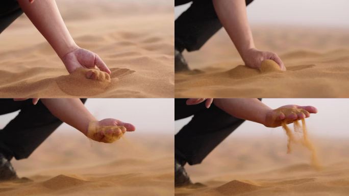 男人在沙漠用手抓起沙子特写