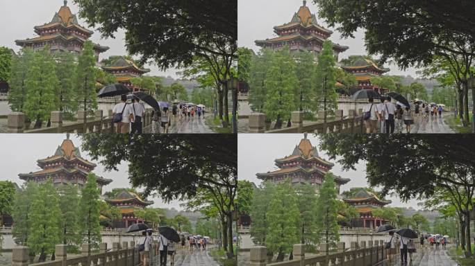 实拍大雨中顺德顺峰山公园游客走向宝塔参观