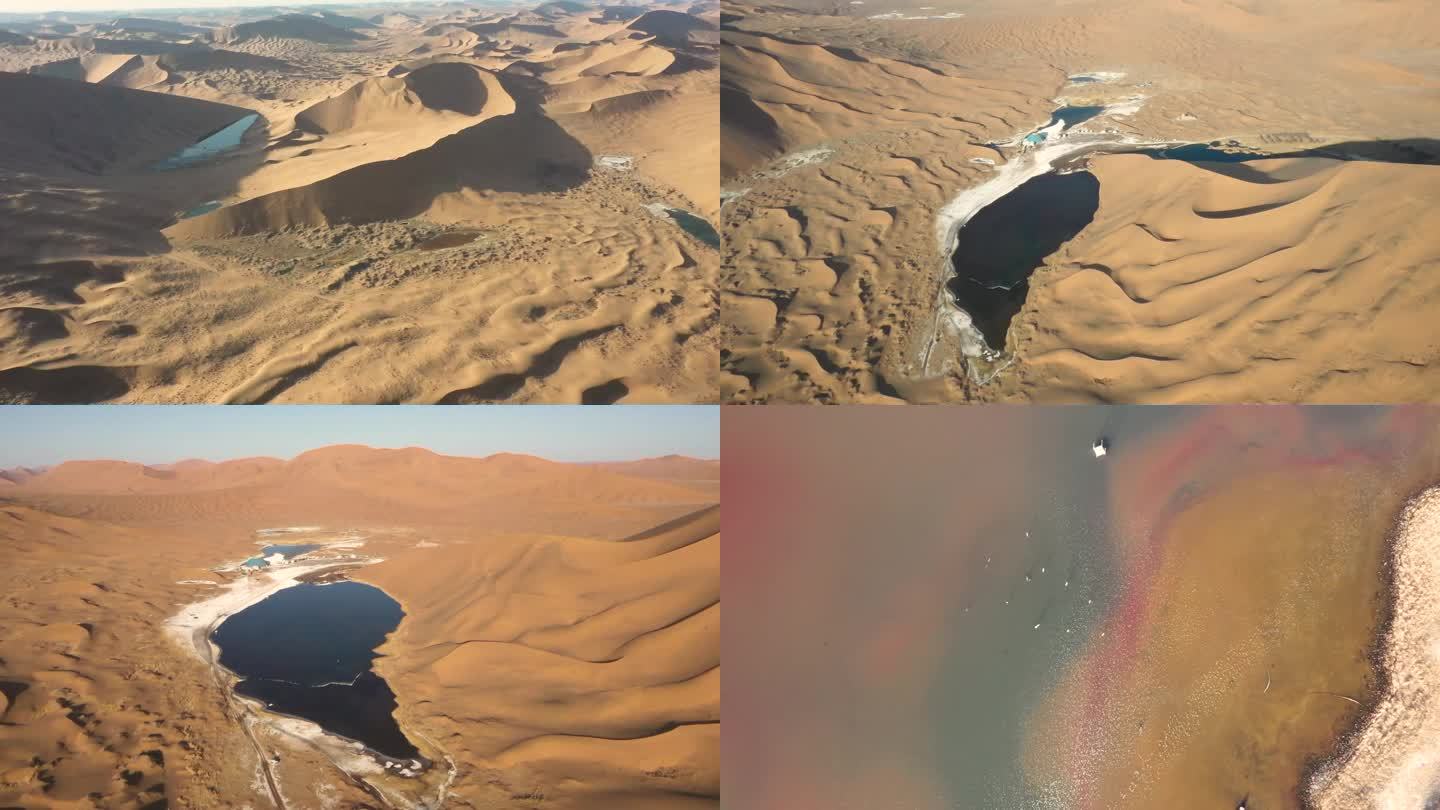 航拍巴丹吉林沙漠中的巴丹湖湖中沙丘倒影
