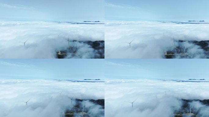 阳光下桂林山区的云海与风力发电风车