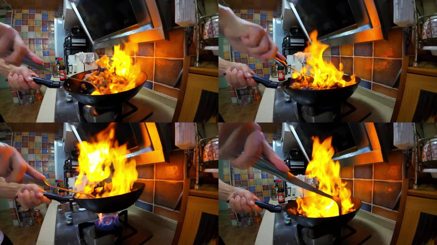家庭厨房烹饪姜母鸭颠勺火焰锅气慢镜头