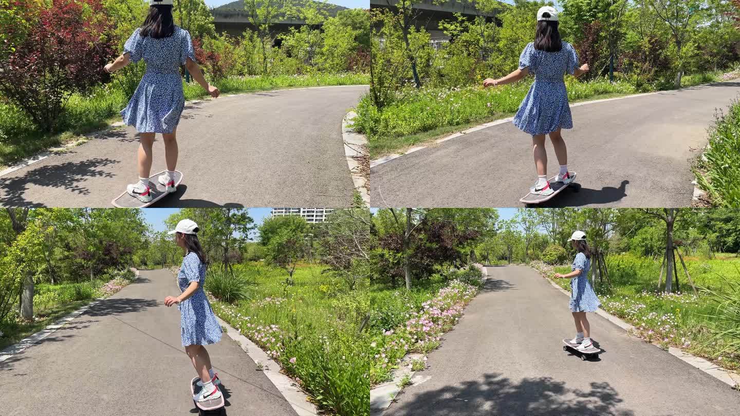 一名戴着帽子的年轻少女在公园练习滑板