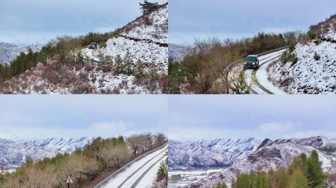4k航拍雪后山路上行驶的汽车