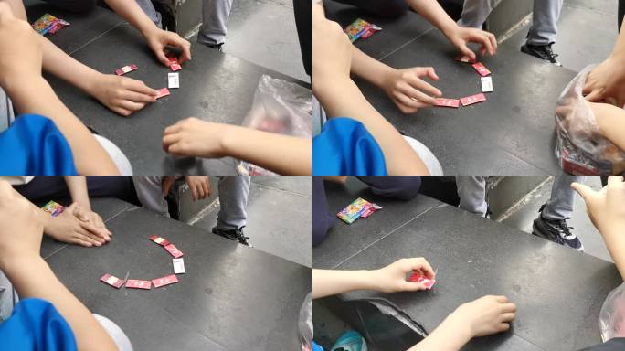 小学生玩烟卡游戏