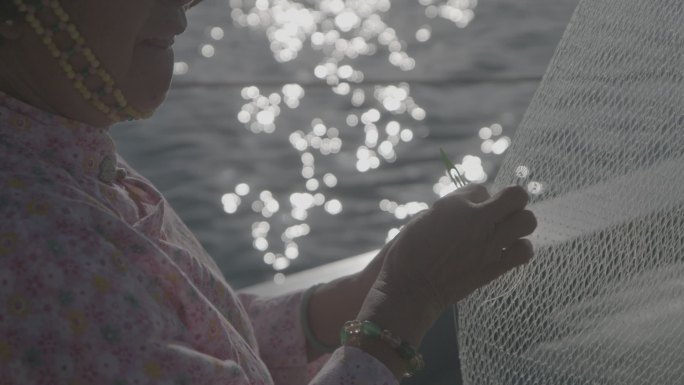夕阳 大海 编织渔网 渔网  渔女