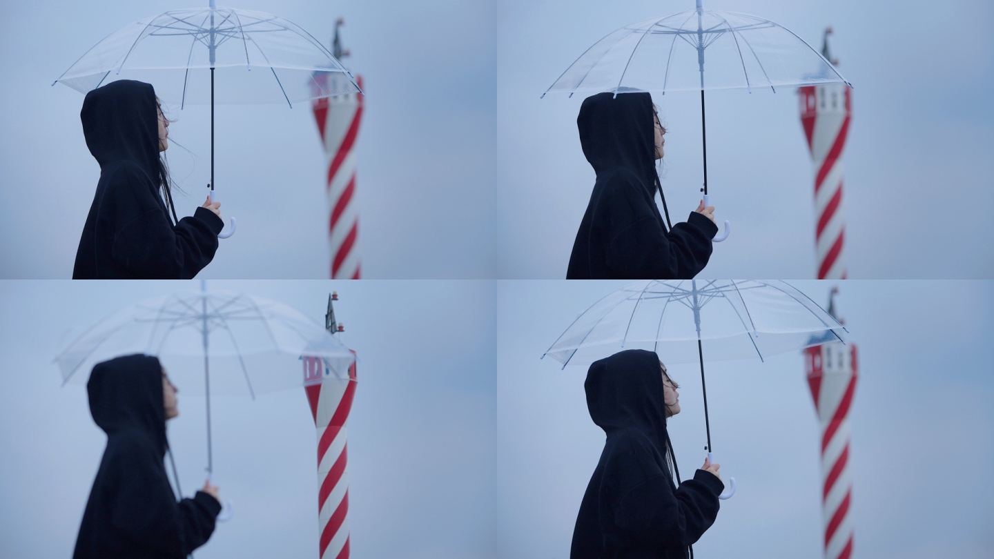 唯美文艺雨天女孩打着伞看向远方