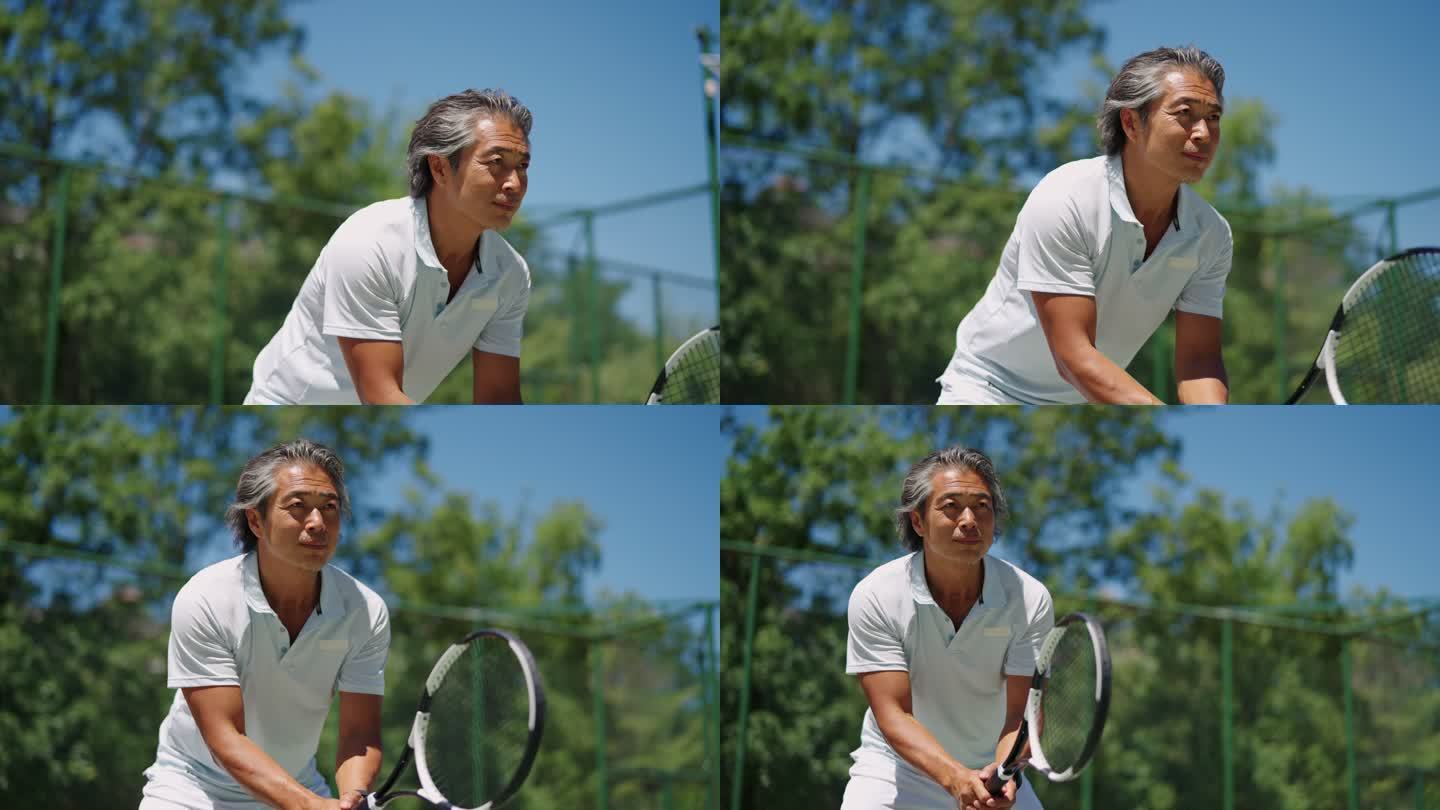 中年男子打网球
