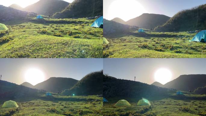 夏天露营山顶的早晨阳光风景