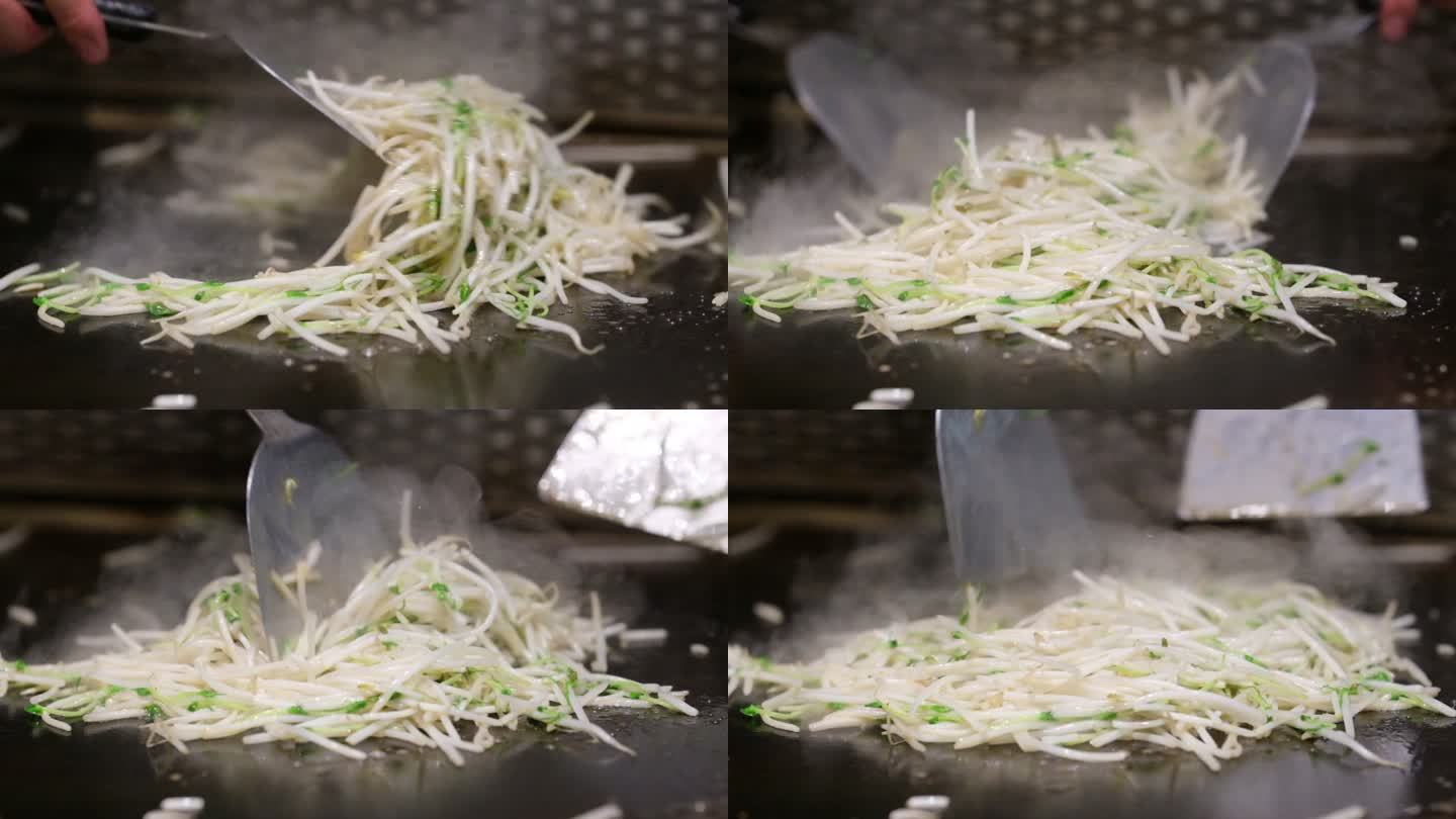 日式铁板烧翻炒炒绿豆芽的超慢动作特写