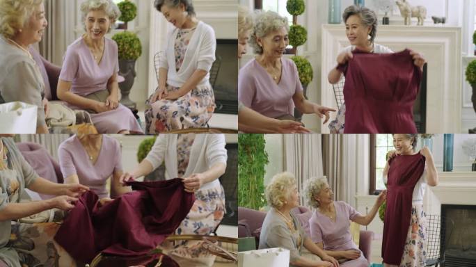 老年女子向朋友展示新买的裙子