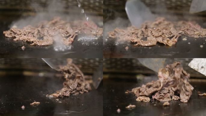 日式铁板烧翻炒牛肉的超慢动作特写