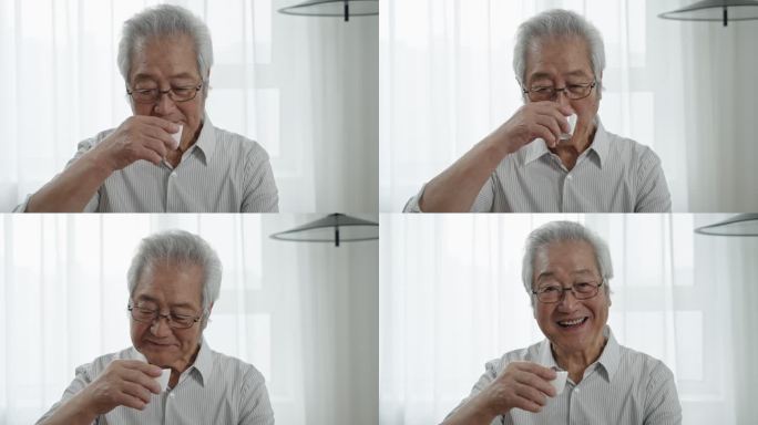 开心的老年男子喝茶