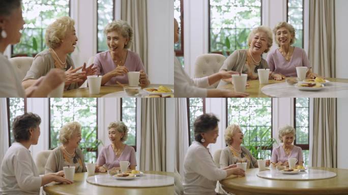 快乐的老年闺蜜在家喝咖啡聊天