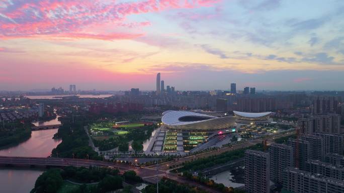 苏州园区斜塘奥体中心日落晚霞城市风景航拍