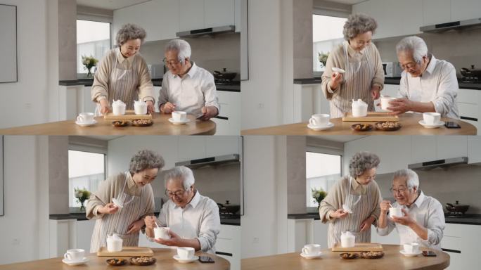 快乐的老年夫妇吃早餐