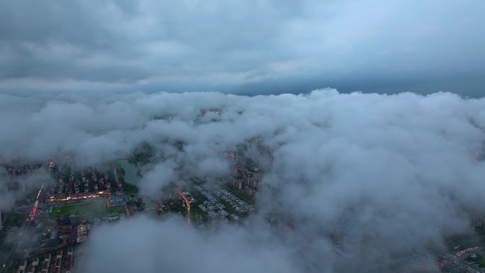 云雾缭绕下苏州园区城市风景奥体中心航拍