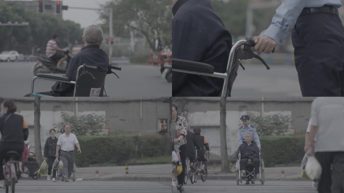 民警扶残疾人轮椅过马路