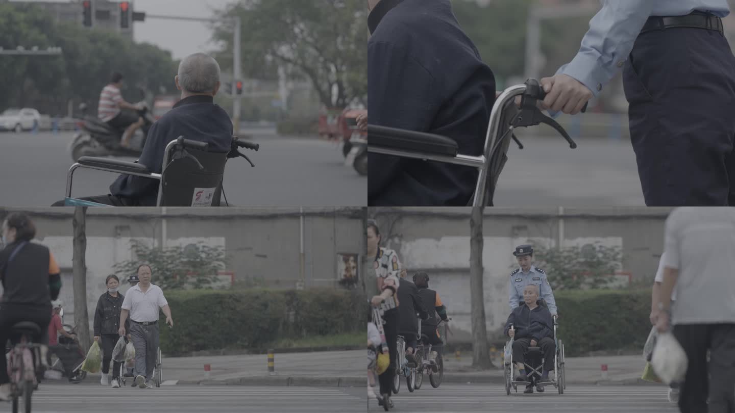 民警扶残疾人轮椅过马路