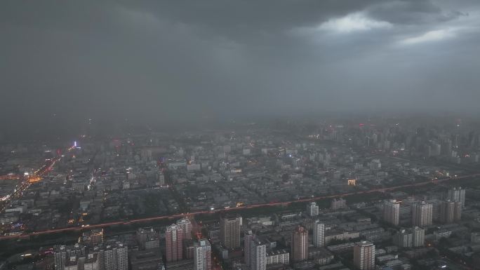 航拍西安城区永宁门钟楼体育场狂风暴雨闪电