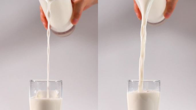 新鲜纯牛奶倒出流动的广告