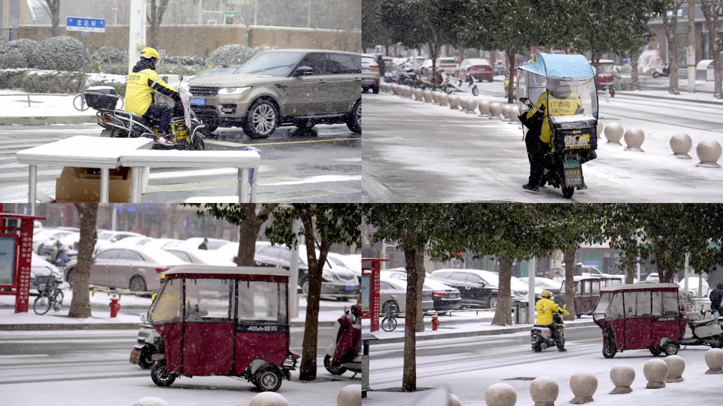大雪暴雪天气美团外卖员骑电动车送餐