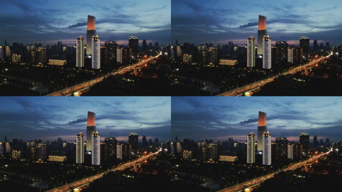 航拍-武汉汉口江滩的大楼夜景与车流